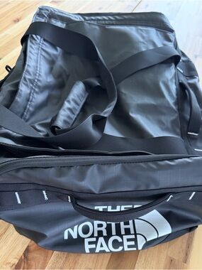 The North Face Black Base Camp Voyager Duffel Bag with White Logo 62L